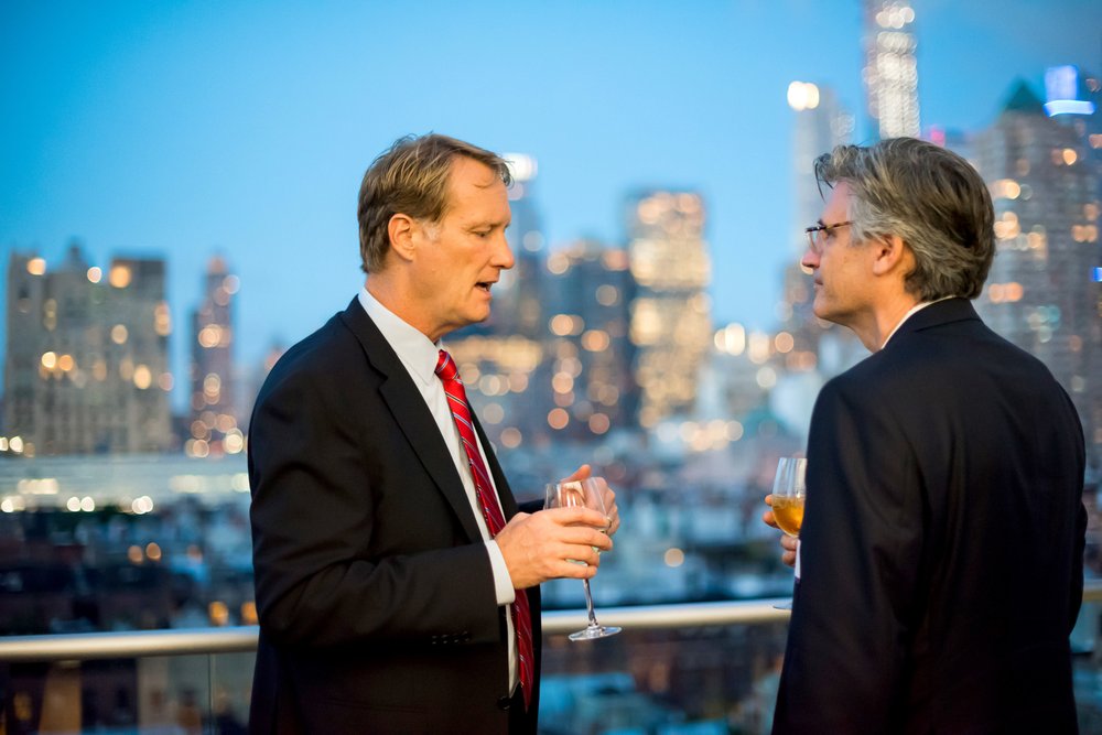 Guests at an event at dusk